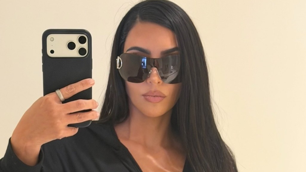 Kim Kardashian Doubles up on Bikinis & Leaves Plenty Exposed