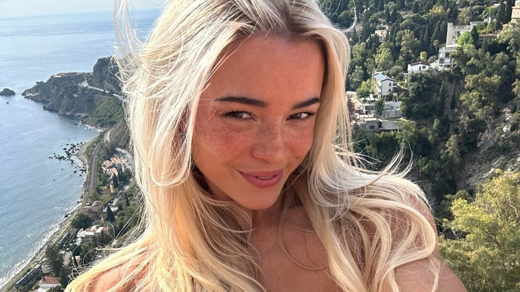 Livvy Dunne Layers ‘Baywatch’ Tee Over Red-Hot High-Cut Swimsuit