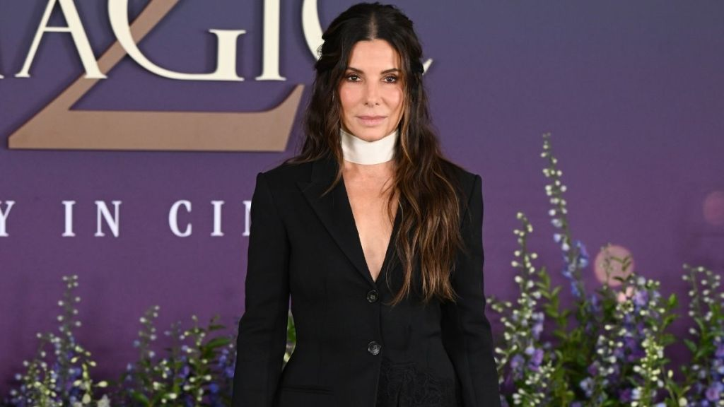 Sandra Bullock’s Ultra Plunging Ulla Johnson Gown Hangs on for Dear Life