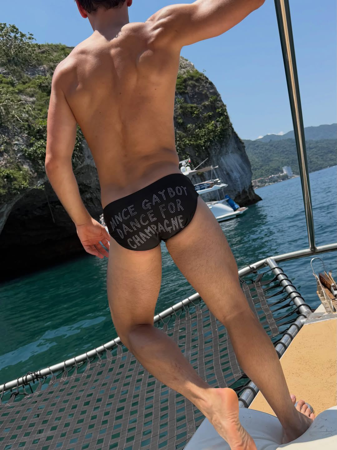Tom Daley ‘dances for champagne’ as he shows off abs in tiny trunks