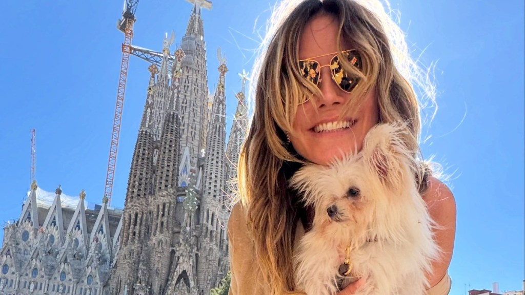 Heidi Klum’s Plunging Leather Gown Goes Bold With a Thigh-High Slit