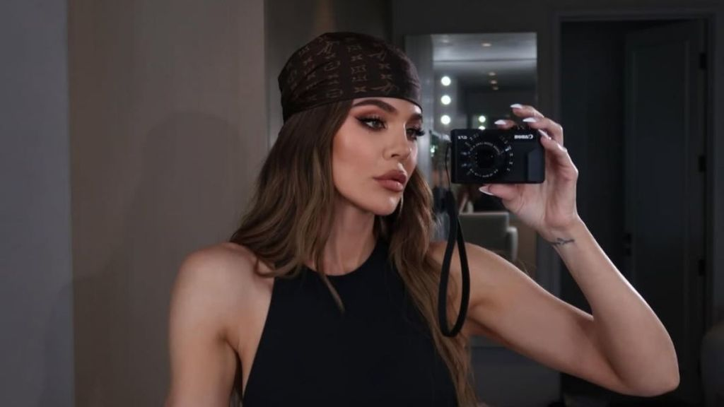 Khloe Kardashian Is a Golden Goddess in Plunging Micro Minidress