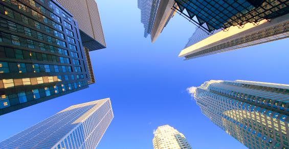 Regional Bank Pullback Exposes Widest Spreads in Years on Commercial Mortgage Bonds