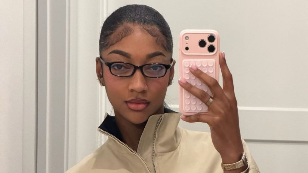 Angel Reese Elevates Cutout Top & Micro Shorts With Reebok Sneakers