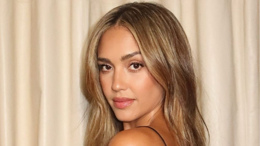 Jessica Alba’s Plunging Aritzia High-Slit Dress Hangs by the Thinnest Strings