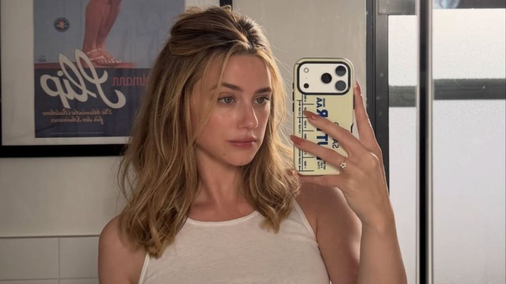 Lili Reinhart’s Plunging Micro Minidress Rides High up Her Thighs