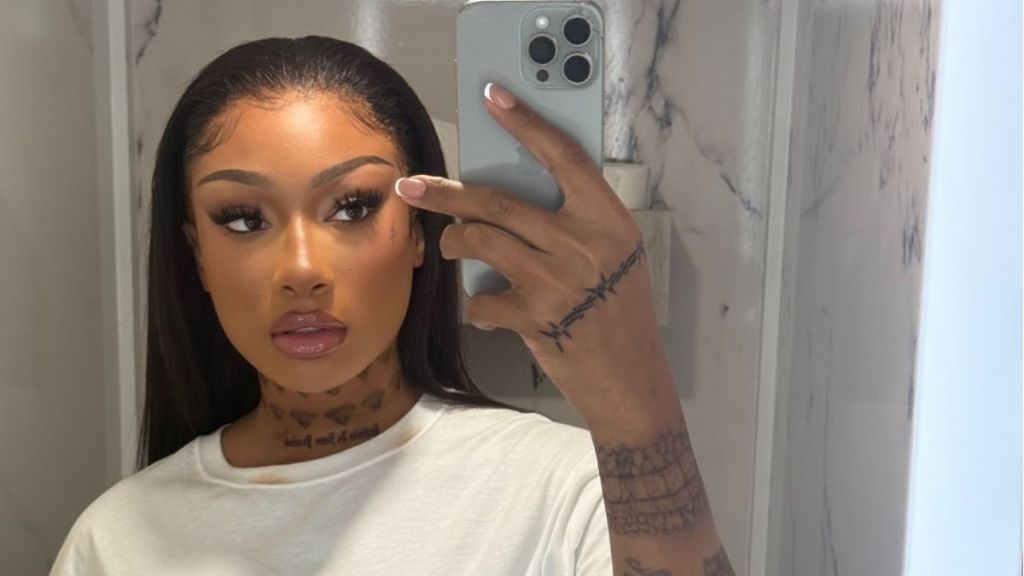 Megan Thee Stallion Barely Covers up in a Completely Sheer White Lingerie