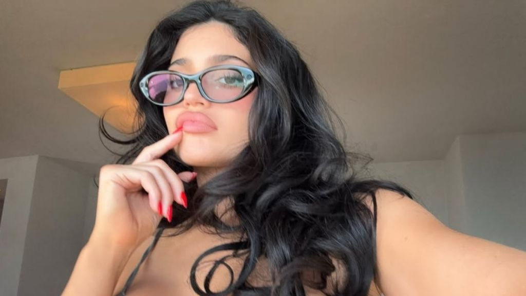 Kylie Jenner Lies in Bed Wearing Skimpy Khy x Frankies Bikinis Two-Piece