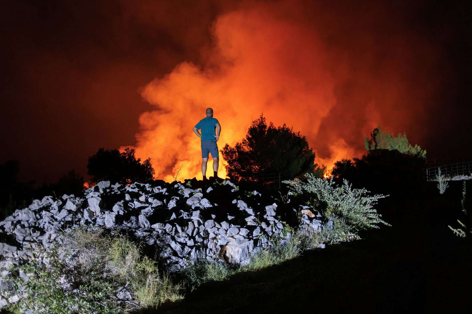 Wildfires rage across Europe as heatwaves drive record temperatures