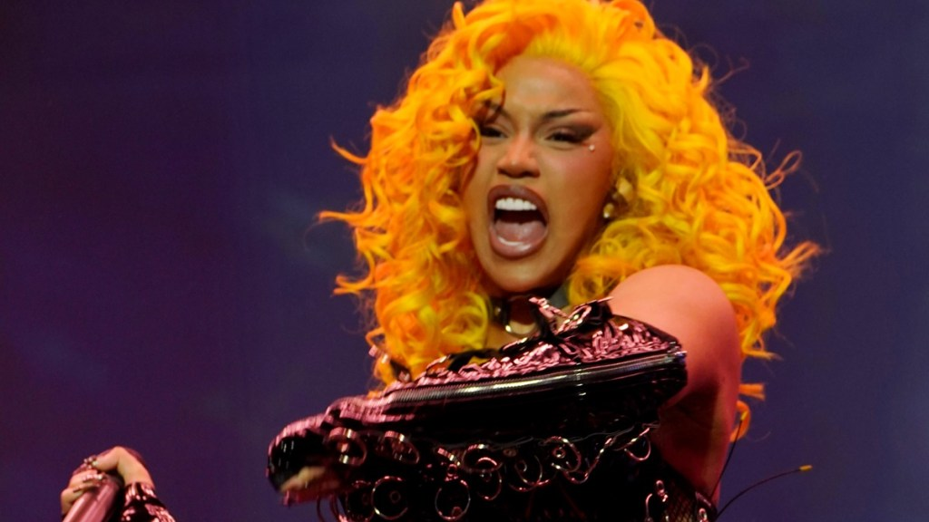 Cardi B Has Paris Paparazzi Jaw-Dropped in Curve-Hugging Midi Dress