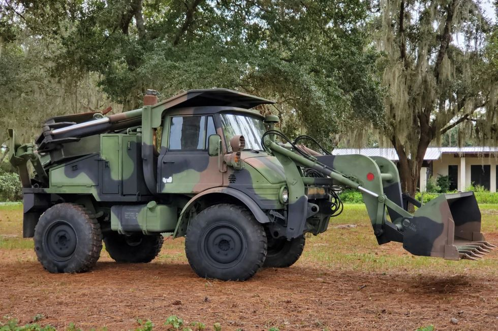 Ferarri Display Engine, Toy Land Rover, Unimog Workhorse Are Our BaT Picks to Start 2023