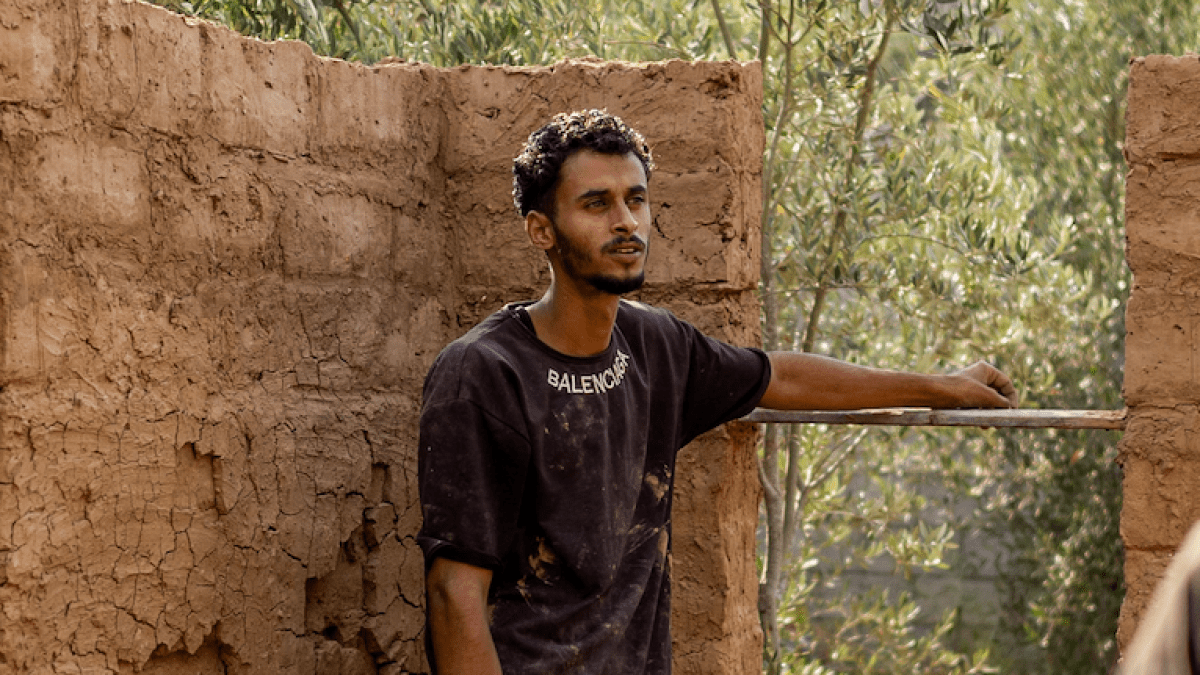 Displaced Palestinian builds mud shelter as tents offer little relief