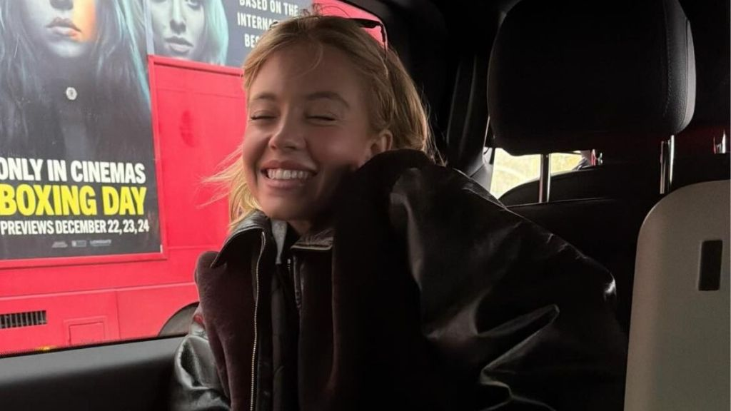 Sydney Sweeney Gives a Cheeky Peek of Lacy Lingerie Under Denim Overalls