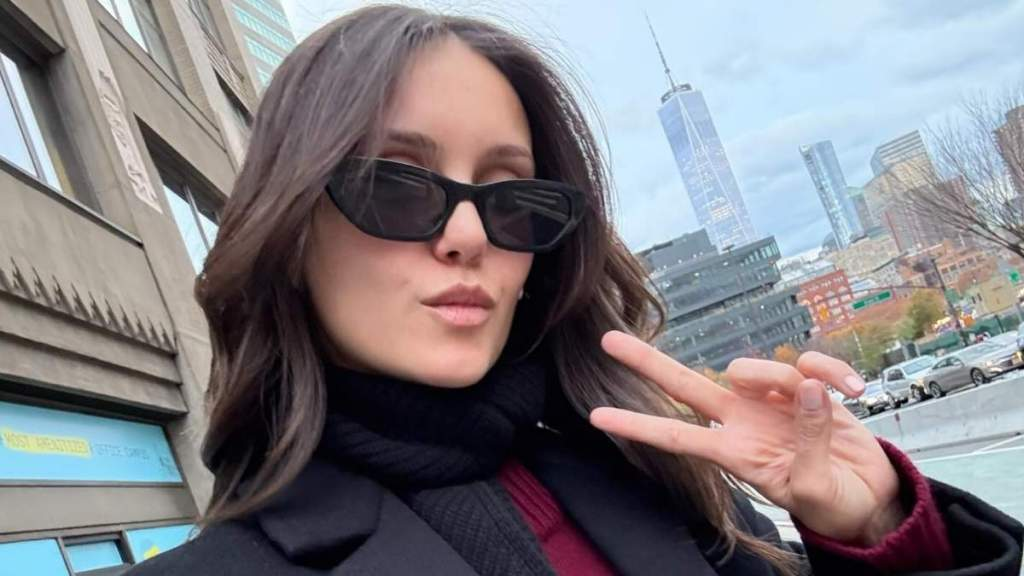 Nina Dobrev’s Plunging Dress Comes With a Daring Thigh-High Slit