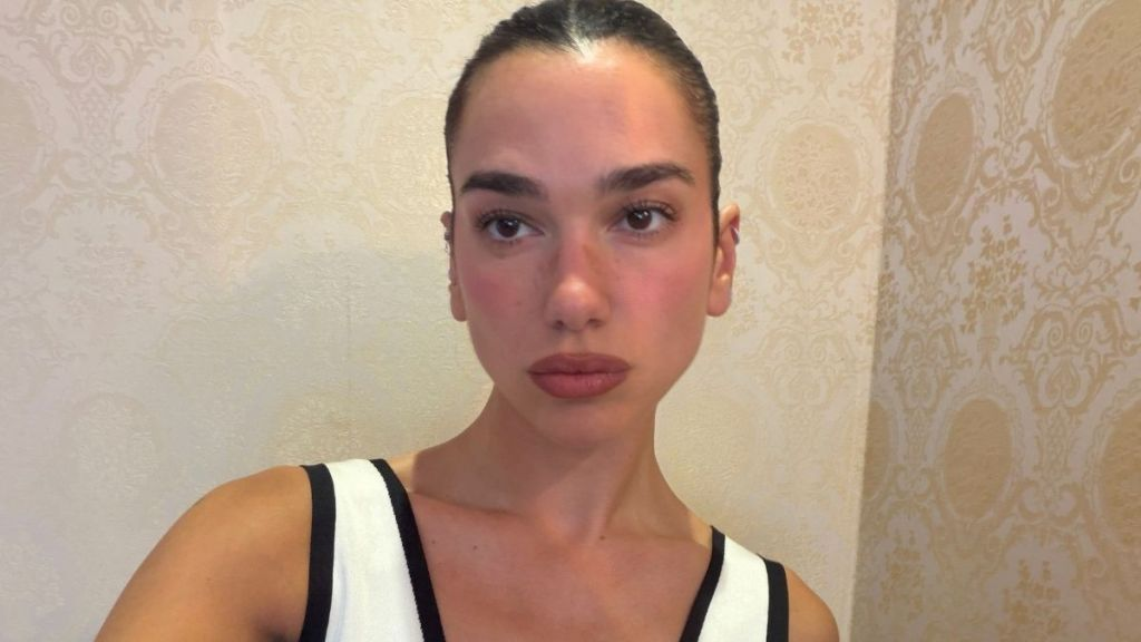 Dua Lipa’s Plunging Chanel Cutout Dress Has a Ridiculously High Slit