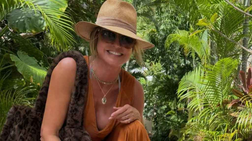 Heidi Klum Nearly Spills Out of Plunging Dress With Stringy Bikini Underneath