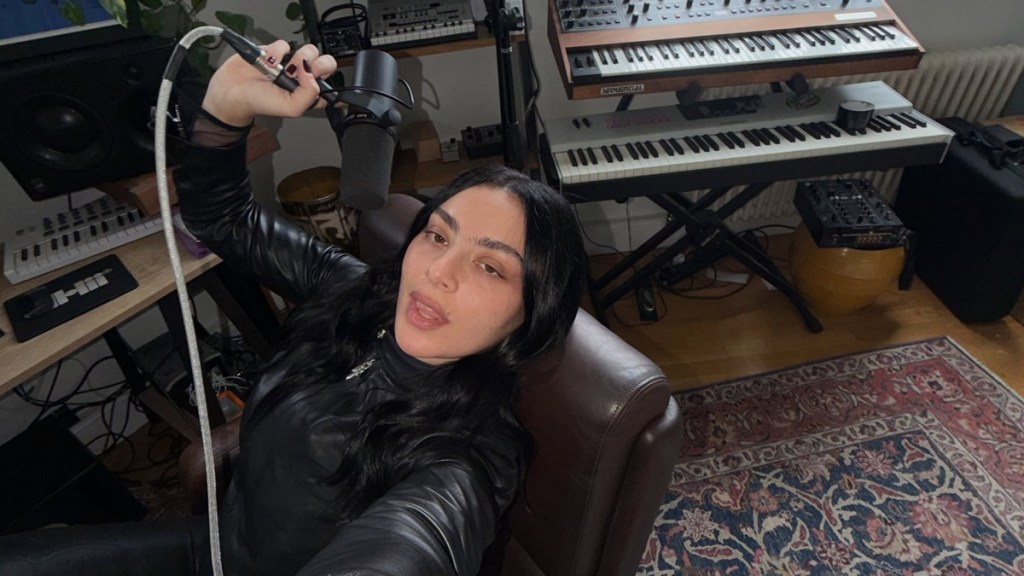 Charli XCX Models a Flirty Lacy Bra That Highlights Every Curve in Steamy New Photos