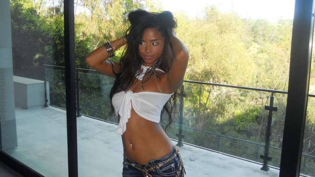 Tyla Lifts Her See-Through Micro Minidress To Reveal Lacy Lingerie