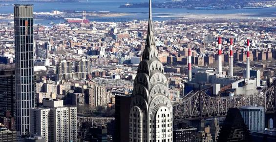 Wall Street Brings Bankers Back to Offices Remade for Hybrid Era