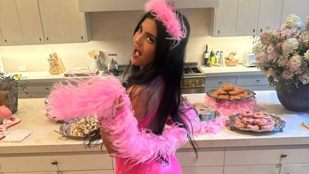 Kylie Jenner’s Lacy Lingerie Peeks Through Tiny Saint Laurent Coat